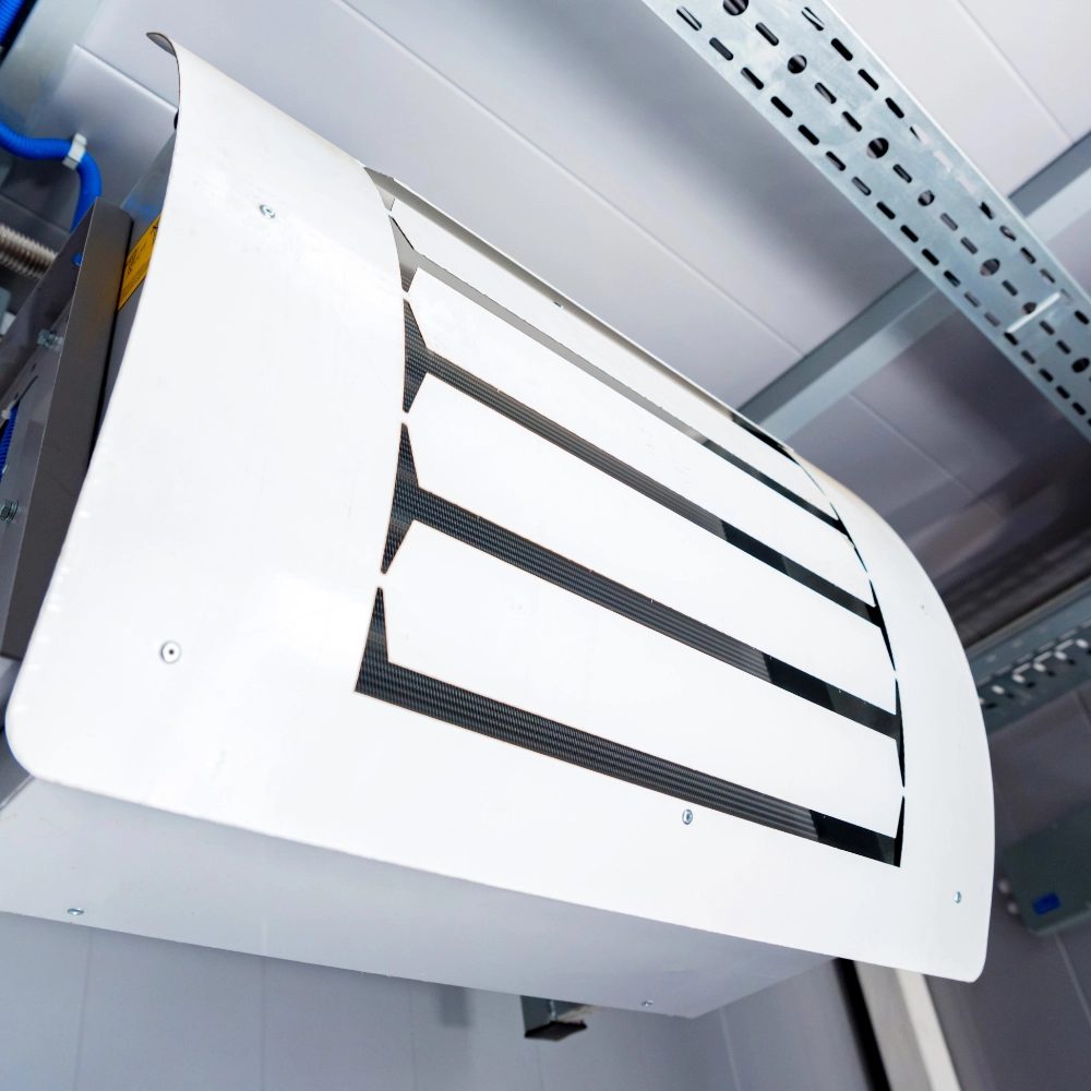 Mechanical ventilation unit installed inside a commercial ceiling system